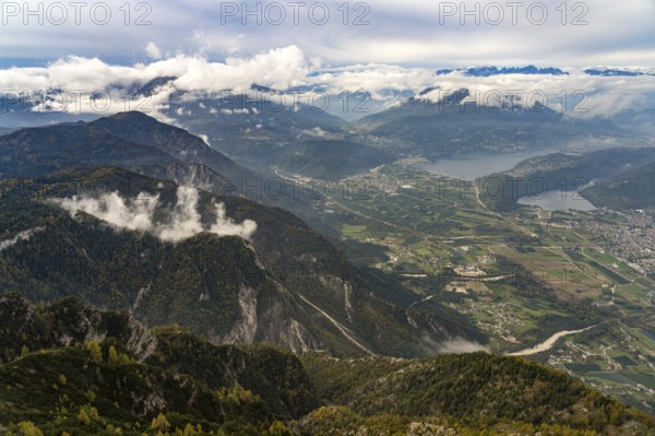 View from the summit of Mount Pizzo di Levico to the lakes in the Sugana Valley, Trentino, Italy,