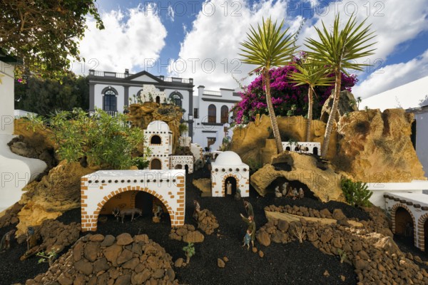 Christmas cot, white houses, palm trees, Cumulus, old town of Haria, Lanzarote, Canary Islands,