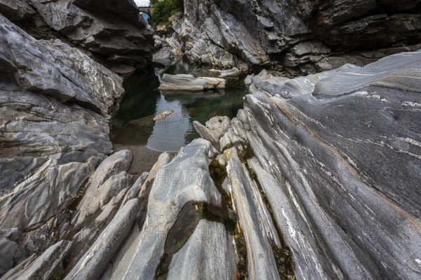 Rocks, granite rock formations in the Maggia River near Ponte Brolla, in the Maggia Valley, Valle