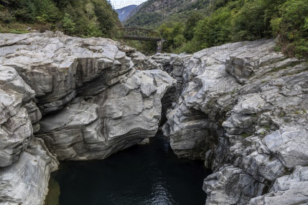 Rocks, granite rock formations in the Maggia River near Ponte Brolla, in the Maggia Valley, Valle