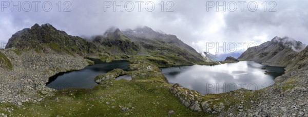 Mountain landscape with cloudy peaks and mountain lakes Wangenitzsee and Kreuzsee, Schober Group,