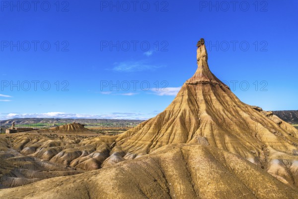 Eroded rock formations create a dramatic landscape in the bardenas reales desert, navarre, spain,