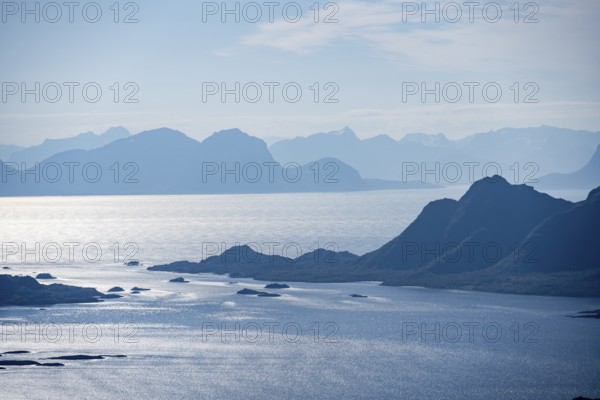 Mountain peak and fjord Austensfjorden, fjord landscape and sea, view from the summit of