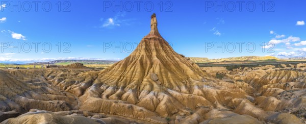 Eroded rock formations creating a breathtaking panorama in the bardenas reales desert under a