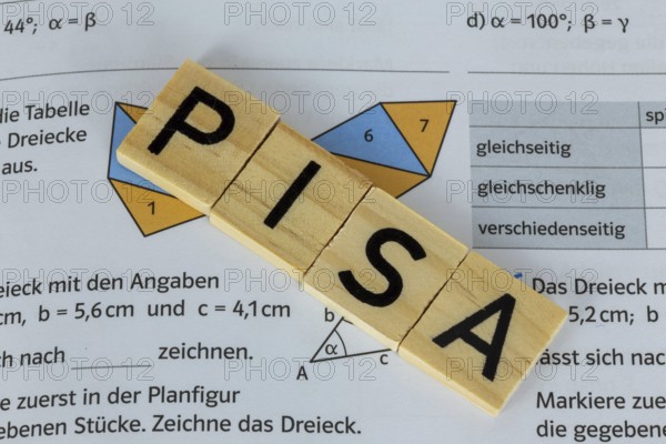 PISA study Symbolic image: Maths problems in the textbook of a comprehensive school pupil show the