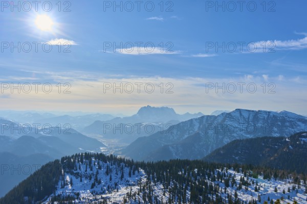 Snow-covered mountains under a clear blue sky with bright sunshine, Steinplatte, Waidring, Tyrol,