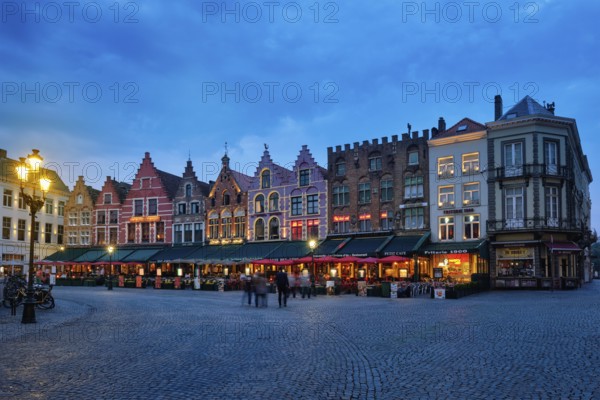 Bruges, Belgium, May 29, 2018: Bruges Grote markt square famous tourist place with many cafe and