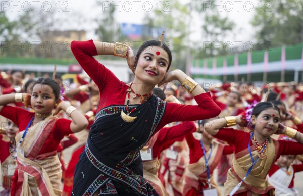 Participants with an instructor dance on the final day of a Bihu dance workshop ahead of Rongali