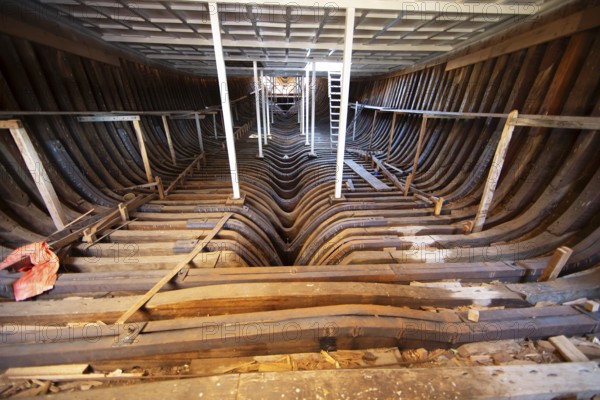 Interior of a dhow under construction, dhow shipyard in Sur, province of Janub ash-Sharqiyya, Oman,