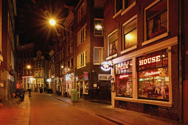 Zeedijk popular street with many restaurants, historic city centre, near red light district,