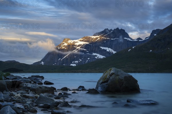 Landscape with sea and mountains on the Lofoten Islands, view over the fjord Flakstadpollen to