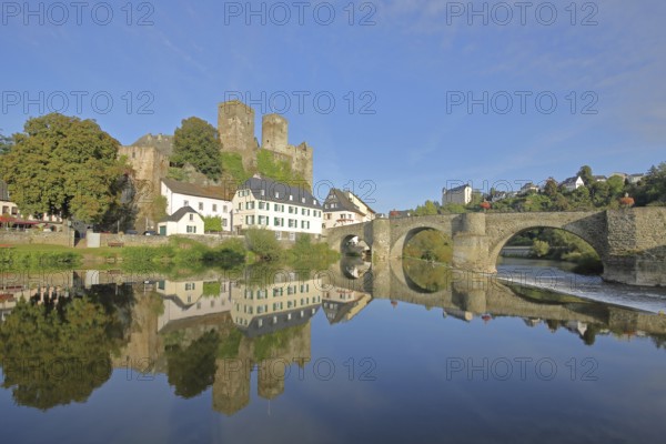 Old Lahn bridge built 1448 with castle built 12th century, Lahn valley, reflection, historic stone