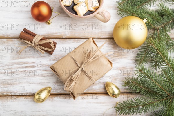 Christmas or New Year composition. Decorations, box, golden balls, cinnamon, fir and spruce