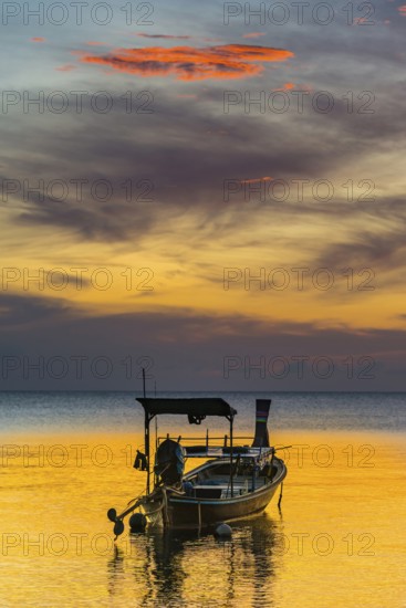 Longtail boat in sunset, sunset, horizon, evening light, boat, sun, evening mood, cloudy sky,