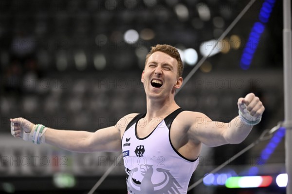 Nils Dunkel GER cheers after routine on rings gymnastics, EnBW DTB-Pokal, Porsche-Arena, Stuttgart,