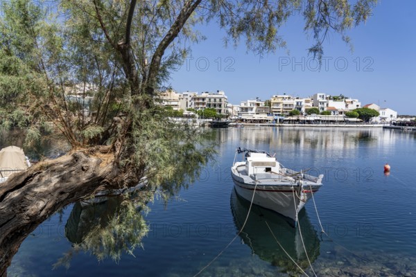 The village of Agios Nikolaos, in the eastern part of Crete, view over Lake Voulismeni, connected