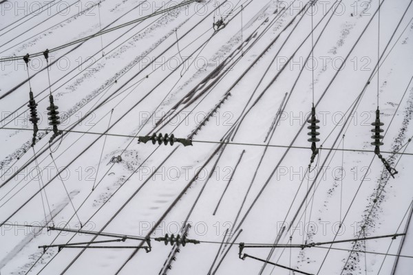 Onset of winter with lots of fresh snow and temperatures below -5 degrees during the day, railway