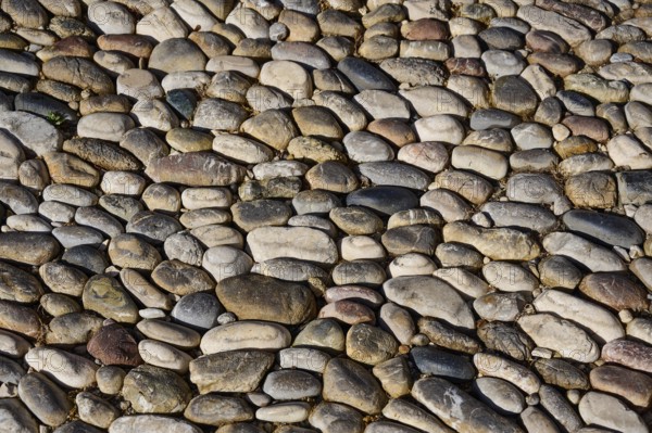 Detailed view of an area paved with different coloured pebbles, Knights Street, Rhodes Old Town,