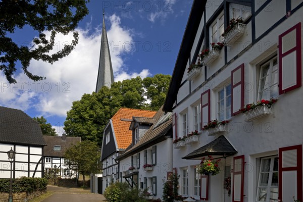The old town centre with half-timbered houses and the church tower of Sankt Viktor, Schwerte, Ruhr