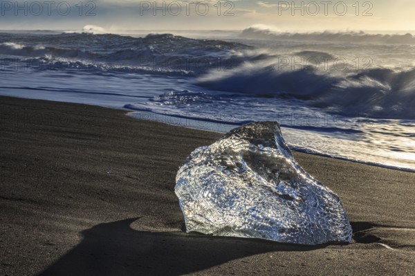 Ice floe on the beach, waves, sunny, morning mood, winter, Diamond Beach, Breidamerkursandur,