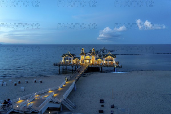 The pier of Sellin, evening mood, sunset, 394 metres long, with restaurant, jetty, island of Rügen,