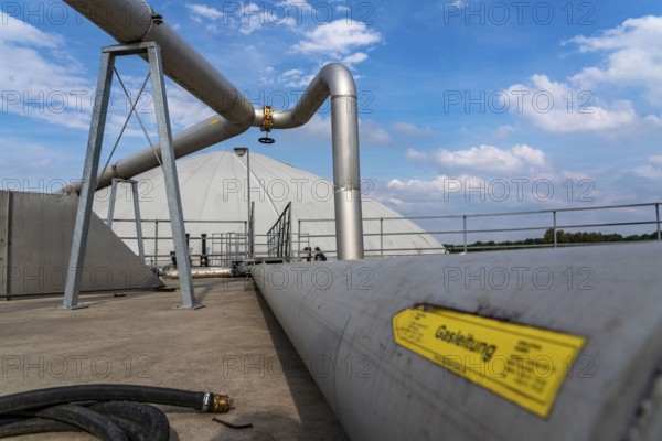 Biogas plant, gas storage, with dome, use of solid manure as energy source, gas pipelines, on a