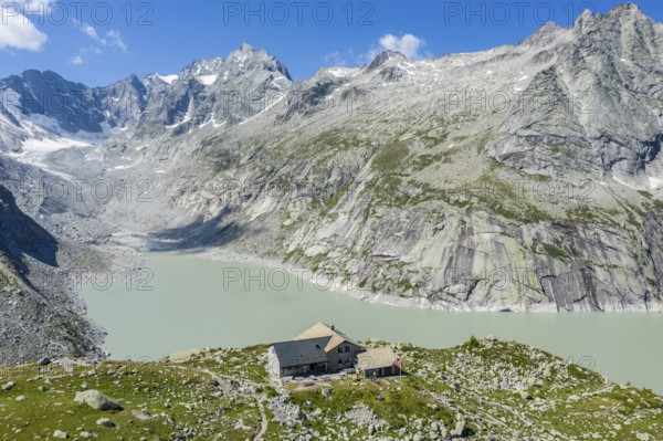 Capanna da l'Albigna, Albinga hut, above dam of reservoir Lake Albigna near village Vicosoprano,