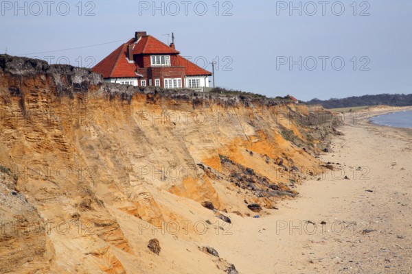 House on cliff top subsequently demolished in March 2011 because of coastal erosion, Easton