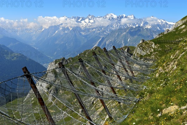 Snow nets as avalanche protection at the summit of Pierre Avoi, behind the summit chain of the