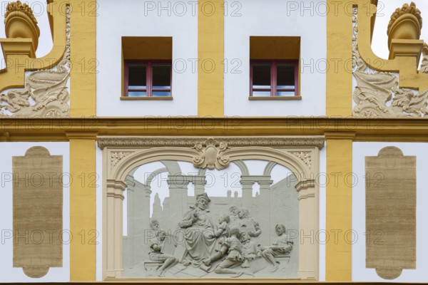 Relief with teacher and pupils on the façade of the Luitpold Primary School, built in 1901 in Art
