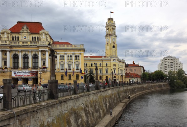 Romania, county area, Oradea, Grosswardein, town hall with bell tower at the river Repede, Crisul