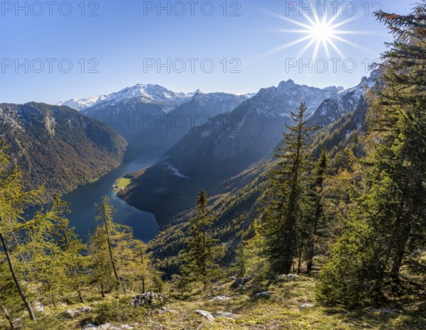 Panoramic view of the Königssee from the Archenkanzel viewpoint, autumnal forest and snow-capped