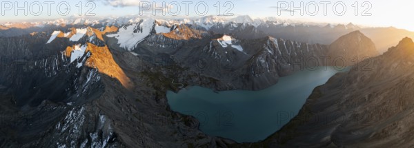 Evening mood, mountain panorama, aerial view, 4000 metre peak with glacier, mountain pass and