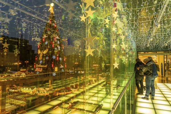 Christmas market in Dortmund, Hansaplatz, view from a pedestrian gallery between 2 department