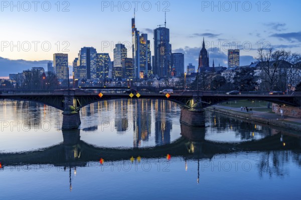 Skyline of the city centre of Frankfurt am Main, river Main, dusk, Ignatz-Bubis-Brücke, Hesse,