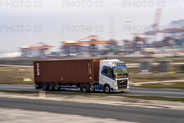 Container lorry, bringing containers from Euromax Container Terminal, the seaport of Rotterdam,