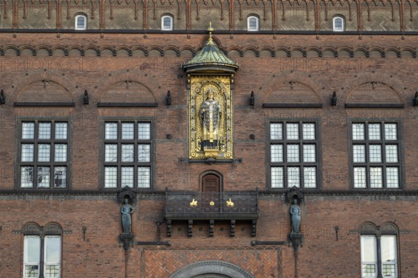 Brick façade with gilded sculpture of Bishop Absalon, Town Hall in the National Romantic style by