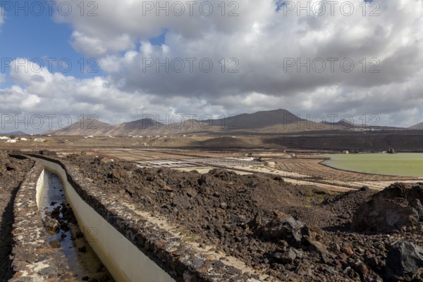 Sea salt extraction, Janubio salt works, Salinas de Janubio, Lanzarote, Canary Islands, Spain,