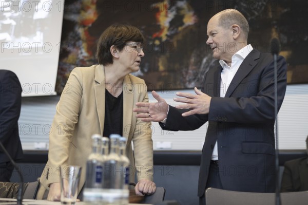 Olaf Scholz (SPD), Federal Chancellor speaks with Saskia Esken, Federal Chairwoman of the SPD,
