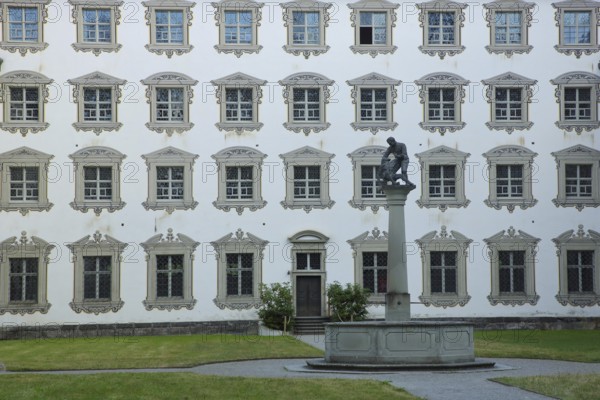 Inner courtyard with fountain and baroque illusion architecture, illusion painting, window, row,