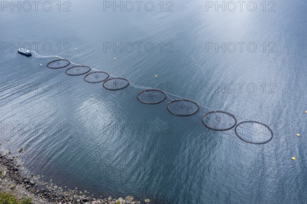 Aerial view of a salmon farm, rainy weather, grey sky, Vesteralen islands, Norway, Europe