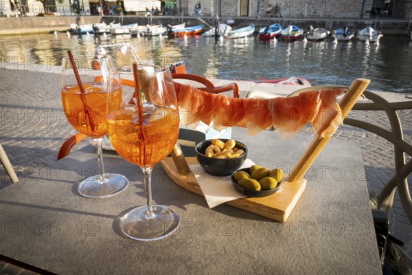 Aperol with ham, olives, Mediterranean, bistro, snack, restaurant, gastronomy, bar, drink, alcohol,