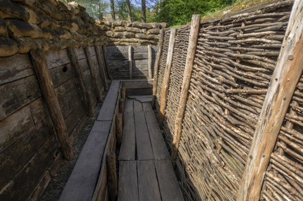 German WW1 trench showing fire step, wooden duckboards and woven wickerwork branches at the