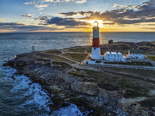 Sunset over Portland Bill Lighthouse from a drone, Portland Bill, Isle of Portland, Dorset,