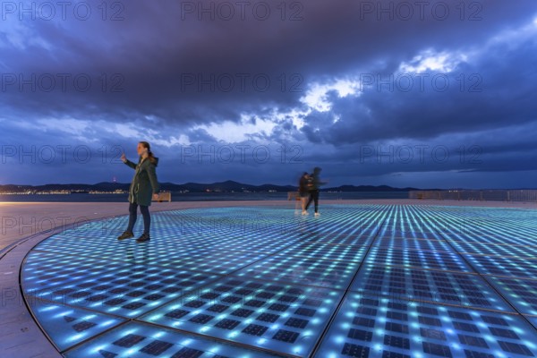 Artwork and solar installation Greeting to the sun at dusk, Zadar, Croatia, Europe
