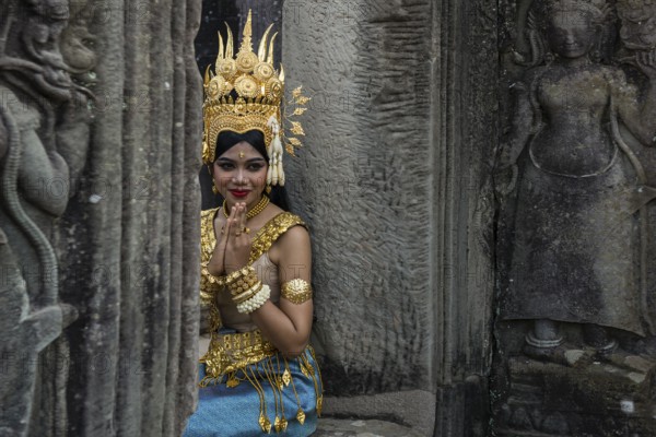 Young woman dressed as a temple dancer, Apsara, Bayon Temple, Angkor Wat, Angkor, UNESCO World