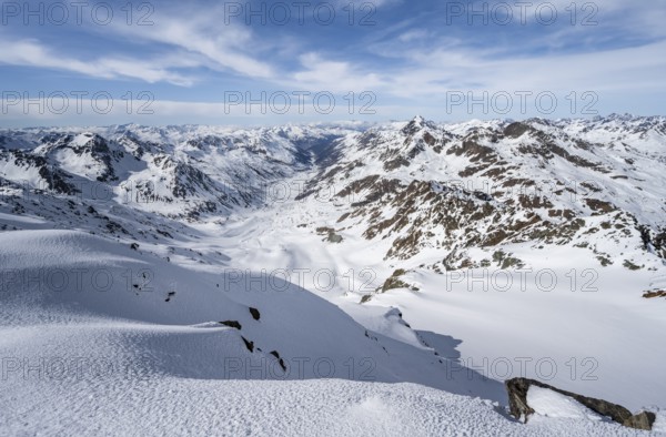 View from the summit of Piz Grialetsch in winter, mountain panorama with Dürrboden valley and view