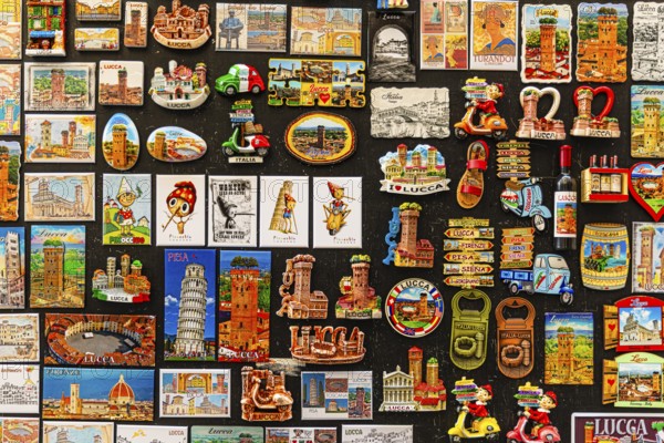 Magnetic boards with Tuscan motifs in a souvenir shop, historic city centre, Lucca, Tuscany, Italy,