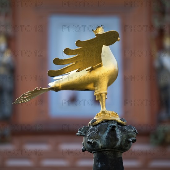 Gilded imperial eagle as a fountain eagle on the market fountain in front of the Kaiserworth