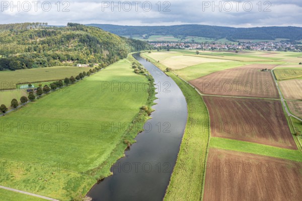Aerial view over fields and meadows at the Weser river, east of village Wahmbeck, Weserbergland,